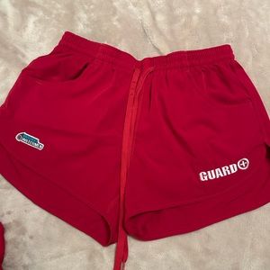 Women’s Watermen red drawstring guard shorts size small